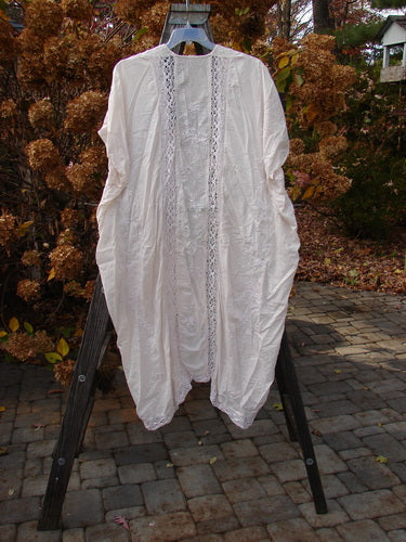 Magnolia Pearl European Cotton Embroidered Lace Duster, Antique White, OSFA - Open flowing white dress with lace trim, cap drop sleeves, and gathered lace seams.