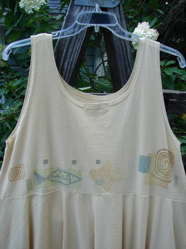 1995 Patio Rose Dress Trail Fish Glint OSFA: White tank top featuring colorful fish and square patterns, displayed on a plastic hanger.