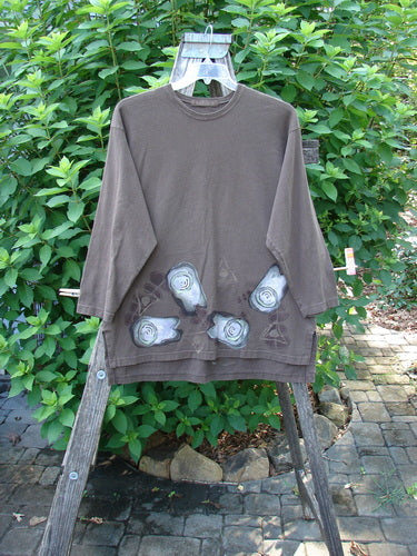 1998 Long Sleeved Vented Tee Tumble Stone Stick Size 1 displayed on a swing, showcasing its drop shoulders and thicker rib neckline from BlueFishFinder.com's vintage collection.