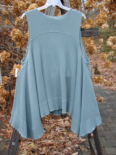 1992 Thermal Tunic Vest, grey green, OSFA, with dippy hemline, deep V neckline, and rounded pockets. Vintage collectible with original Blue Fish buttons.
