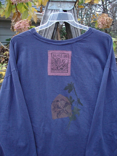 1993 Long Sleeved Tee Center Lotus Flower Medallion Indigo OSFA, featuring a patch and painted lotus flower medallion design, showcasing a vintage style with a wider soft rib neckline.