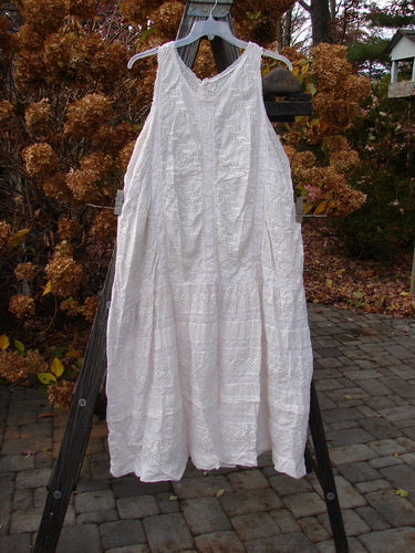 Magnolia Pearl European Cotton Eyelet Jumper in Antique White, featuring lace details and an A-line shape.