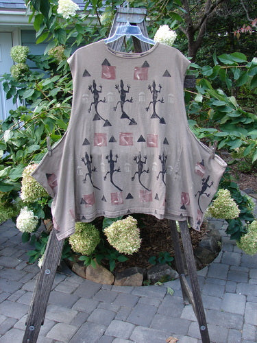 1986 The OverTop Tunic Lizard Mushroom OSFA displayed on a rack, featuring vintage continuous lizard theme paint, square drop hip panels, and a deep rounded neckline with unique sectional panels.