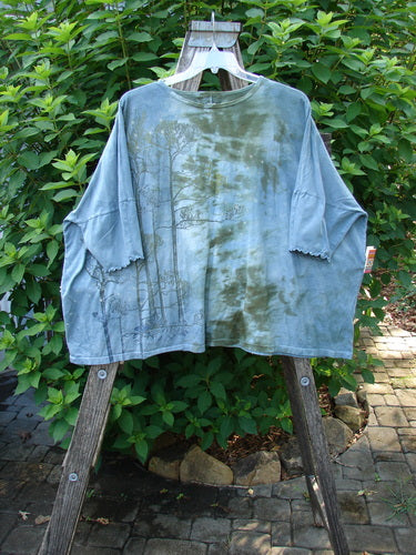 Barclay Dolman Curl Edge Square Pullover Night Star Mottled Moss OSFA displayed on a swinger, showcasing its wide, boxy shape, seamless design, and sweet curly lower arm edgings, reflecting Bluefishfinder.com's creative style.