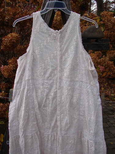 Magnolia Pearl European Cotton Eyelet Jumper, antique white, OSFA, on a clothesline.