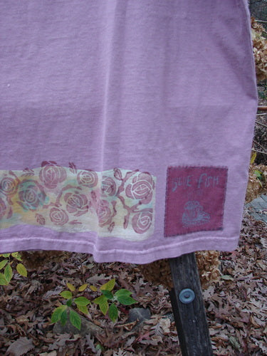 1992 Oversized Tank Continuous Rose Amethyst OSFA features a purple fabric with a signature Blue Fish patch and rose border design, showcasing a wide, boxy shape with deep arm openings and slight crop length.