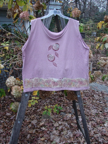 1992 Oversized Tank Continuous Rose Amethyst OSFA displayed on a wooden ladder, showcasing a floral design. The tank features a wide, boxy shape and deeper arm openings, highlighting its vintage Blue Fish Clothing style.