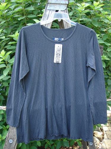 Barclay NWT Modal Batiste Layer Top Unpainted Shadow Size 1 displayed on a hanger, showcasing long narrow sleeves, A-line shape, slight hip flare, and raw edges, embodying BlueFishFinder's vintage aesthetic.