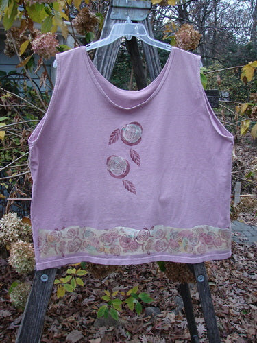 1992 Oversized Tank Continuous Rose Amethyst OSFA features a floral design, wide boxy shape, and deeper arm openings. Part of Bluefishfinder.com’s vintage collection, highlighting creative expression in women’s fashion.