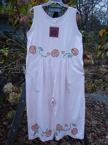 1992 Pant Overall Jumper Rose Sea Shell OSFA: Vintage white jumpsuit with a floral rose theme, featuring wide swingy lowers, original buttons, and a pleated waist, epitomizing Bluefishfinder's creative vintage style.