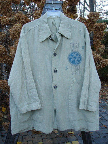 1999 Hemp Yard Coat Far East Cement Size 1: Heavyweight cotton hemp outer with soft flannel lining. Metal buttons, adjustable side tabs, painted pockets. Bust 52, waist 52, hips 56, length 34.