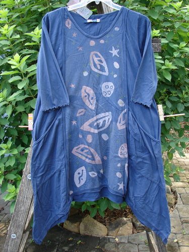 Barclay NWT Wildflower Tunic Star Pathway Dark Sky Size 0: A medium-weight organic cotton tunic with a raw-edged front panel, dippy sides, exterior drop front pockets, and three-quarter sleeves.
