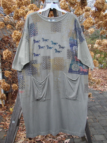 Barclay Bamboo Dress with Lipizzaner Stallion Print, featuring wide dolman sleeves, drop pockets, and a shallow neckline.
