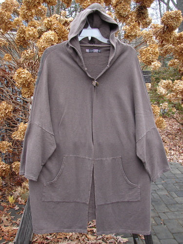 Barclay Hemp Cotton Open Front Hooded Cloak Twig Stone OSFA ai: A medium weight hooded jacket with dolman sleeves and kangaroo pockets.