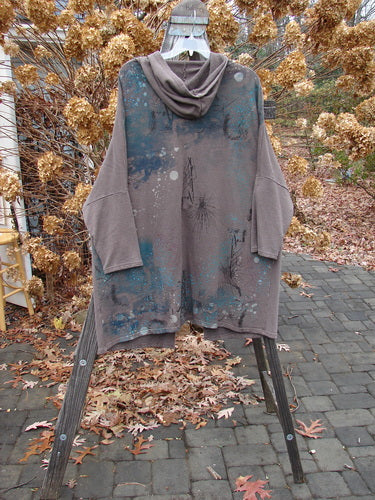 Barclay Hemp Cotton Open Front Hooded Cloak on rack, with kangaroo pockets, dolman sleeves. Twig theme painted on back. Bust 60, Waist 58, Hips 58, Length 36.