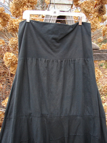 Barclay Batiste Fold Over Wave Layer Skirt on clothes line. Full paneled waistline, varying hemline with pinched waves, large lower sweep. Size 2.