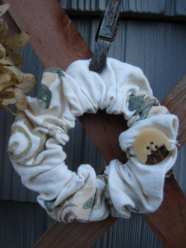 1994 PMU Cotton Button Hair Scrunchie Floral Tea Dye Large: A white scrunchie with a unique button accent, featuring ruffled fabric and a floral theme, showcasing Bluefishfinder.com's sustainable vintage style.