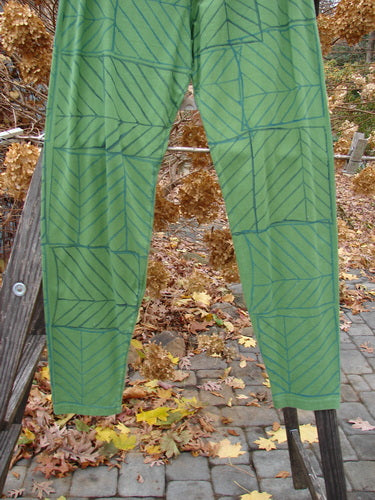 Barclay Cotton Lycra Slim Legging with a pattern of leaves and blue lines. Size 2.