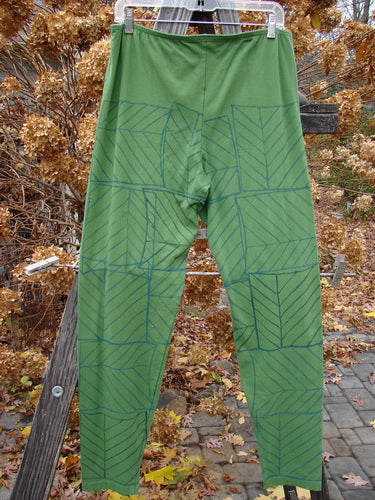 Barclay Cotton Lycra Slim Legging showcasing a green patterned design. Perfect for outdoor activities and expressing individuality. Size 2.