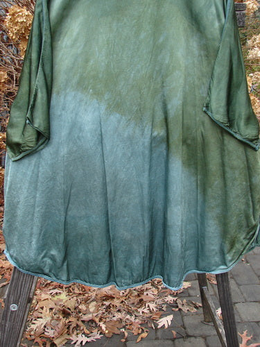 Barclay Viscose Hi Low Tunic with wildflower theme paint, dolman sleeves, and vented sides. Size 2 ai.