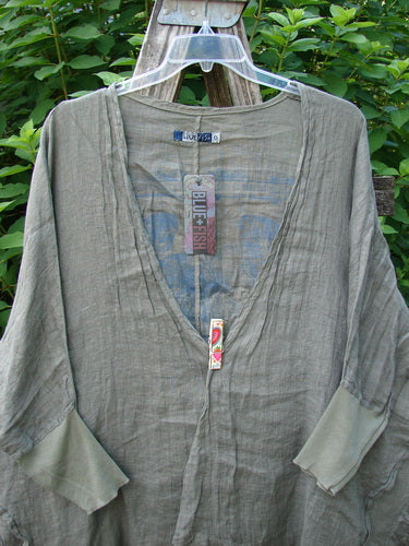 Barclay NWT Linen Open Front Cheerful Crinkle Cardigan with dolman sleeves and floral blossom theme, displayed on a hanger, showcasing its open front and crinkle texture.