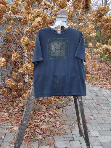 Image alt text: 1999 Short Sleeved Tee with Celtic Clock graphic on black background, size 1.