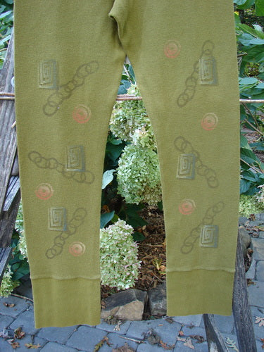 2000 Thermal Layering Lu Pant Soft Geo Greenroot Size 1, featuring intricate designs on green fabric, with ribbed lowers and a replaced elastic waistband, part of BlueFishFinder's vintage collection.