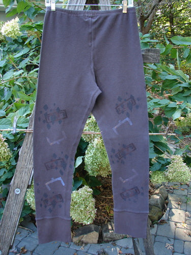 2000 Thermal Layering Lu Pant Soft Geo Brum Size 1, featuring a uniquely painted geometric design, ribbed lowers, and a full elastic waistband, ideal for vintage Blue Fish Clothing enthusiasts.