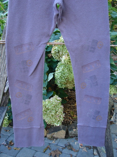 2000 Thermal Layering Lu Pant Soft Geo Eggplant Size 1, featuring intricate designs and a professionally replaced elastic waistband, perfect for vintage fashion enthusiasts seeking unique, pocketless styles with ribbed details.