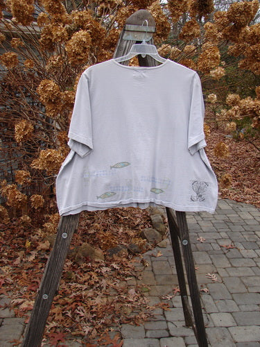 1999 Tiny Pocket Top Fish Water Size 2: A swingy cropped t-shirt with fish swimming around the hemline. Made from organic cotton.