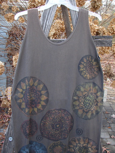 A grey tank top with a holiday-themed metallic pinwheel design, part of the 1992 Holiday Sleeveless Column Dress collection in Grey Sand.