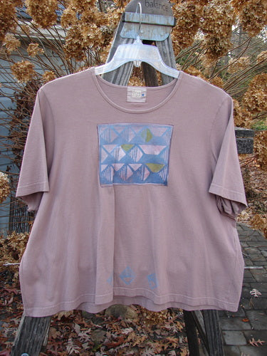 2000 Short Sleeved Crop Tee with Diamond Window design on a t-shirt swinger. Made from Mid Weight Organic Cotton. Bust 52 ~ Waist 52 ~ Hips 54. Length: 23 Inches.