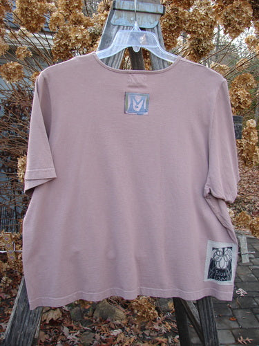2000 Short Sleeved Crop Tee with Diamond Window design in Coralline. Made from Mid Weight Organic Cotton. Features a shallow neckline and widening crop box shape. Bust 52, Waist 52, Hips 54. Length: 23".