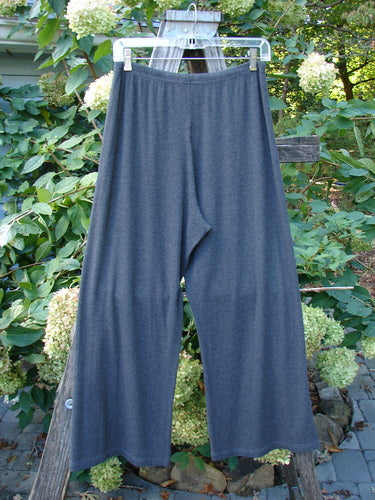 2000 Rayon Lycra Rib Crossroad Road Flare Duo Unpainted Charcoal Heather Size 2 hangs on a clothesline, showcasing its full elastic waistline and slightly flared bottom, perfect for vintage Blue Fish enthusiasts.