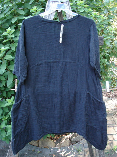 Barclay NWT Gauze Seaside Tunic Dress Unpainted Black Size 0 displayed on a swinger, showcasing its varying hemline, scooped flutter neckline, and wide short sleeves, embodying Bluefishfinder.com's vintage creative expression.