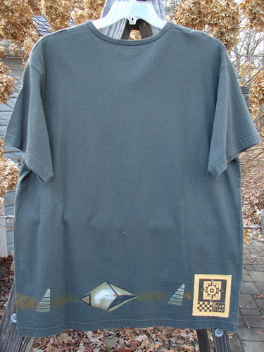 1998 Short Sleeved Tee Diamond Game Domino Size 1: A t-shirt with a design on it featuring a diamond game theme paint and a thinner ribbed neckline. Made from 100% mid-weight organic cotton.
