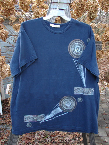 1998 Short Sleeved Tee Arrow Game Crew Blue Size 2: A blue shirt with a design on it. Organic cotton, drop shoulders, ribbed neckline, Blue Fish patch.