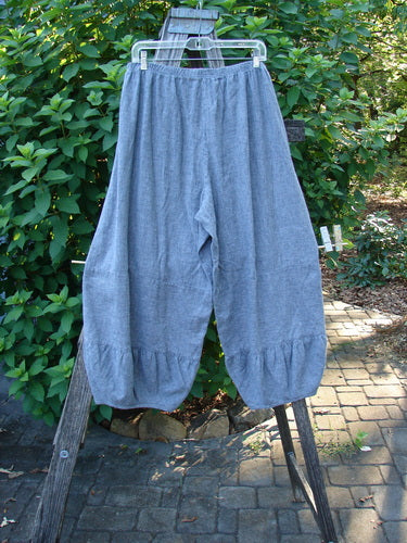 Barclay Hemp Cotton Meadow Pant Unpainted Indigo Stripe Size 1 displayed on a clothes rack, featuring a full elastic waist, bellowing panels, and a slightly cropped length, perfect for spring.