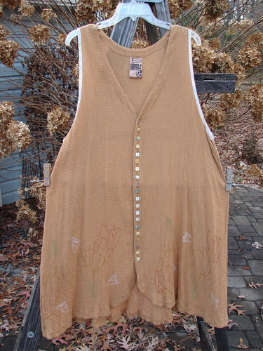 Image alt text: 1998 Gauze Shell Vest Angel Wing Cork Size 2: Brown vest with shell buttons, rounded hemline, hand-dyed silk ribbon edges, A-line shape, and deeper arm openings.