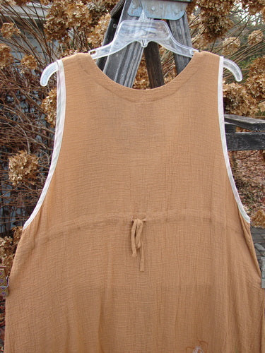1998 Gauze Shell Vest Angel Wing Cork Size 2: A brown dress on a swinger with tiny shell buttons, hand-dyed silk ribbon edges, and a unique A-line shape.