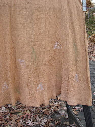 1998 Gauze Shell Vest Angel Wing Cork Size 2: A close-up of a curtain with brown leaves on the ground.