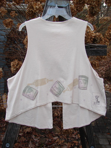 Image alt text: "1999 The Tab Vest Baker Tea Dye Size 2: A white shirt with a painted baking theme design, featuring a tab front, crop rear hemline, and shirt tail front. Made from medium weight organic cotton jersey, double lined. Bust 15 and open, waist 48, hips 54, front length 25, back length 19 inches."