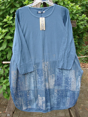Barclay NWT Natalia Round Bottom Tunic City Floral Echo Blue Size 0 on a clothes rack, showcasing its casual dress style with a detailed floral pattern, reflecting Bluefishfinder.com's vintage aesthetic.
