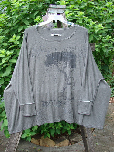 Barclay NWT Rayon Spandex Mariposa Square Top 1923 Tree Grey OSFA displayed elegantly on a hanger, showcasing its unique square cut and draped design, embodying Bluefishfinder.com's vintage aesthetic.