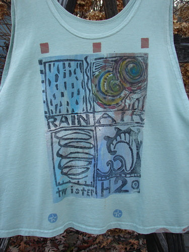 1992 Workout Tank Elements Cucumber OSFA: A white tank top with a graphic design on it, perfect for hot summer days. Slightly smaller size, scoop neckline, and deep arm openings. Made from mid-weight cotton.