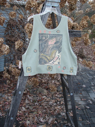 1992 Workout Tank High Heeled Saddle Shoe Rosemary OSFA: A green tank top with a picture on it, perfect for hot summer days.