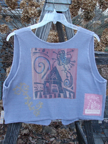 1995 Reprocessed Jazz Vest Magical Home Mulberry Size 1: A blue shirt with a picture on it, featuring a close-up of a painting and a pink and white logo.