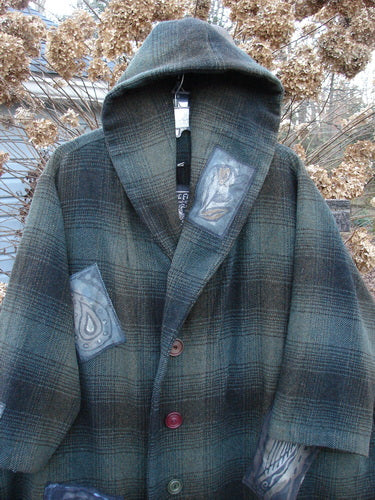 1995 Patched Hooded Autumn Jacket in Cottage Green Plaid. Soft Brushed Wool. Oversize buttons, A-line shape, double-lined hood, deep pockets, patches, Blue Fish signature patch, foldable cuffs. Cozy and rare. Bust 62, Waist 70, Hips 76.