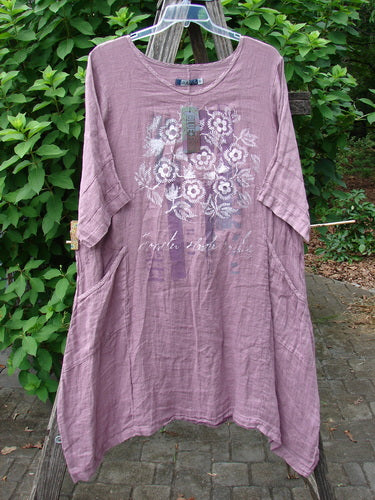 Barclay NWT Linen Wave Urchin Dress Circle Garden Tulsi Rose Size 0 features a purple fabric adorned with intricate white floral patterns, embodying vintage elegance and creative freedom from BlueFishFinder.com.
