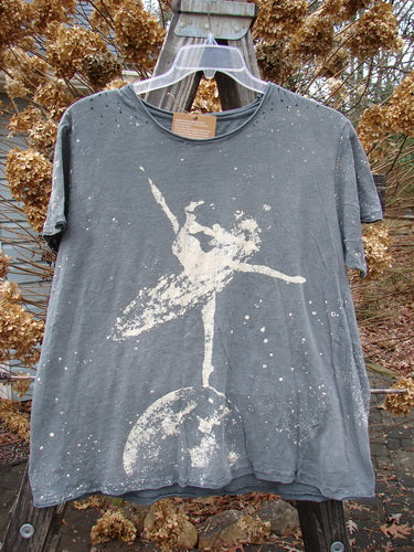 Magnolia Pearl NWT Short Sleeved Boyfriend Tee with Cosmic Ballerina design. A soft, lightweight cotton jersey t-shirt with raw edges and an A-line lower hem. Features a white silhouette of a woman dancing.